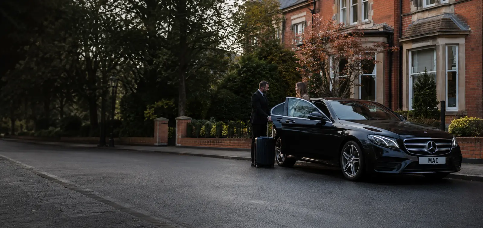 MAC Mercedes and chauffeur arriving at a private address near Wilmslow